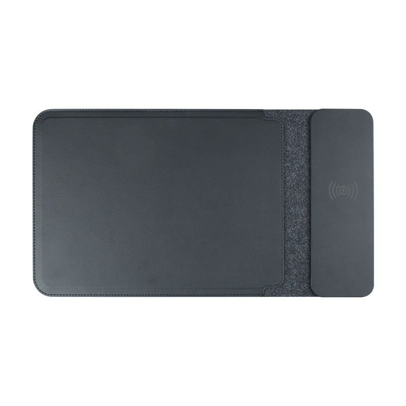 Dark gray wireless charging laptop sleeve laid flat, with stitched edges and a wide closure flap