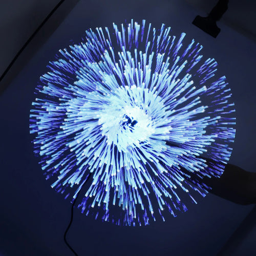 3D hologram fan displaying a circular blue and white LED light pattern against a dark background
